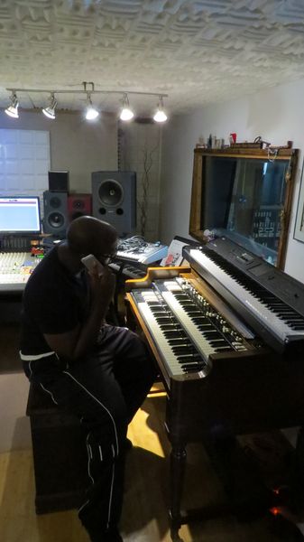 Kingdom Worship member at the Hammond organ in the control room